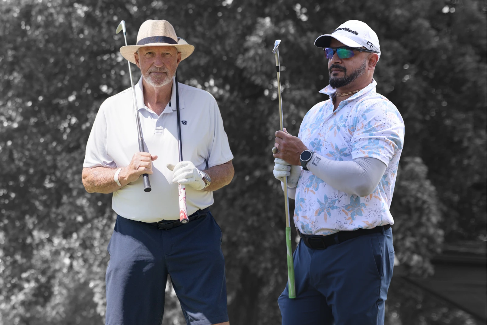 Lord Ian Botham and Kartik Murali playing golf at the Fairway Championship